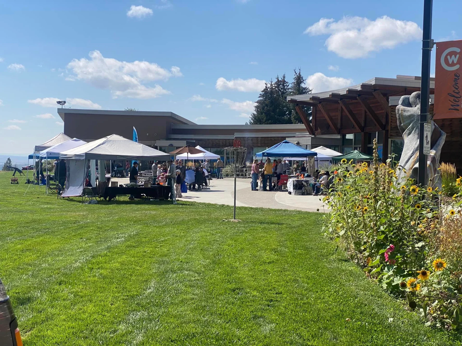 gallery-3 A painting depicting a cowboy leading his herd of cattle through a scenic landscape.